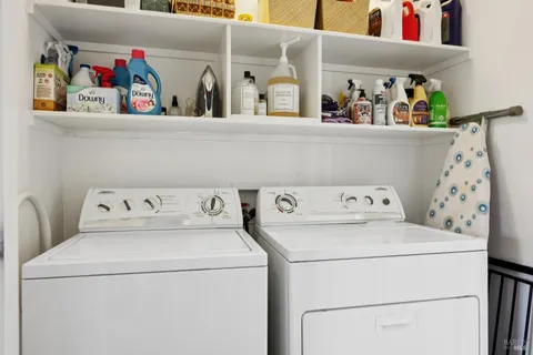 a view of a chairs and table in patio