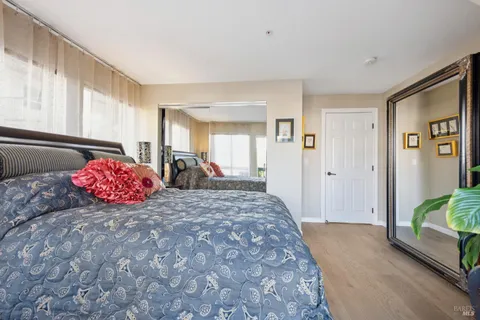 a view of a bedroom with a bed