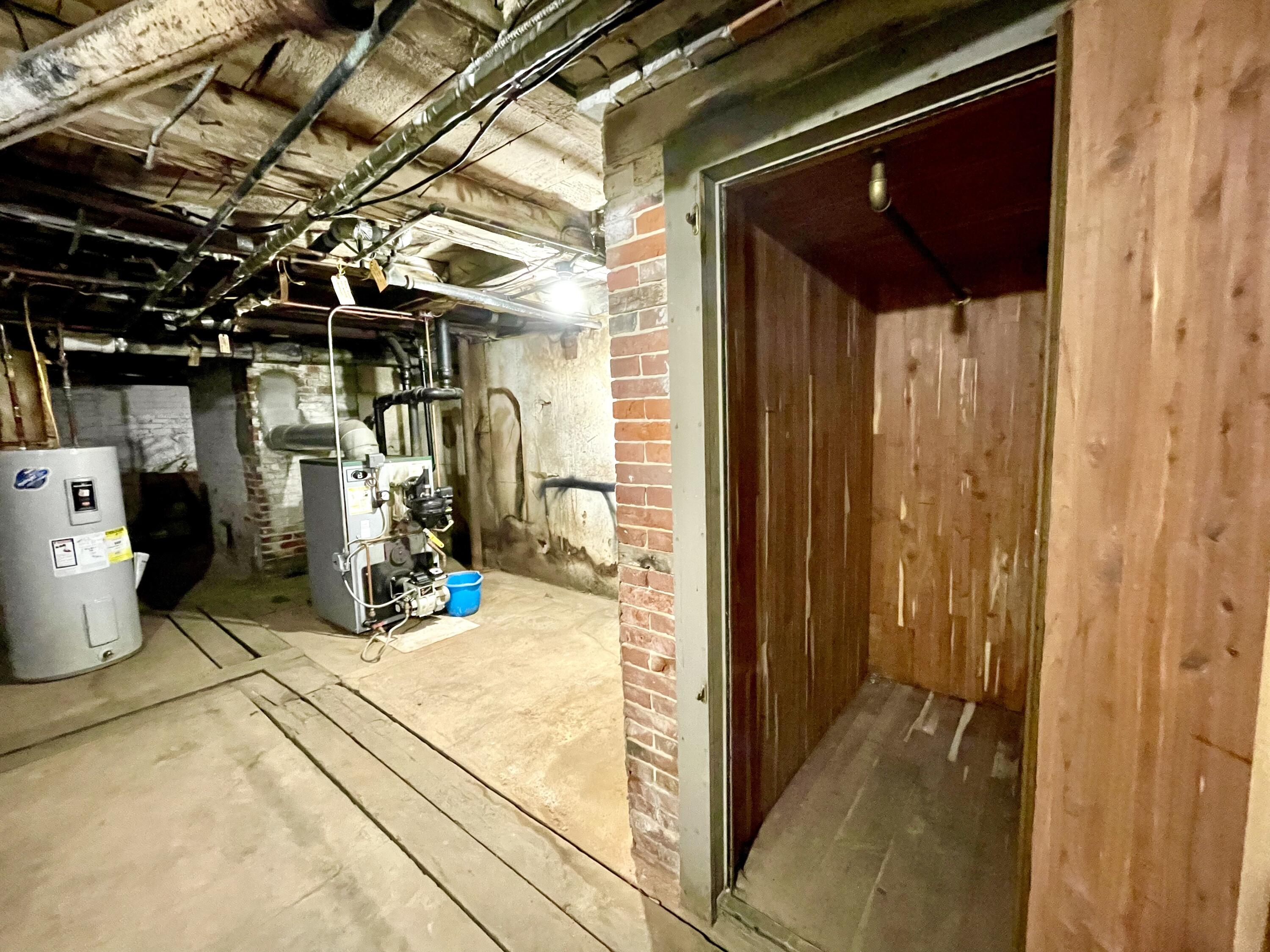 67 Old Winthrop Road Wayne, ME 04284 - Photo 59 of 70 67 OWR cedar closet in basment:boiler