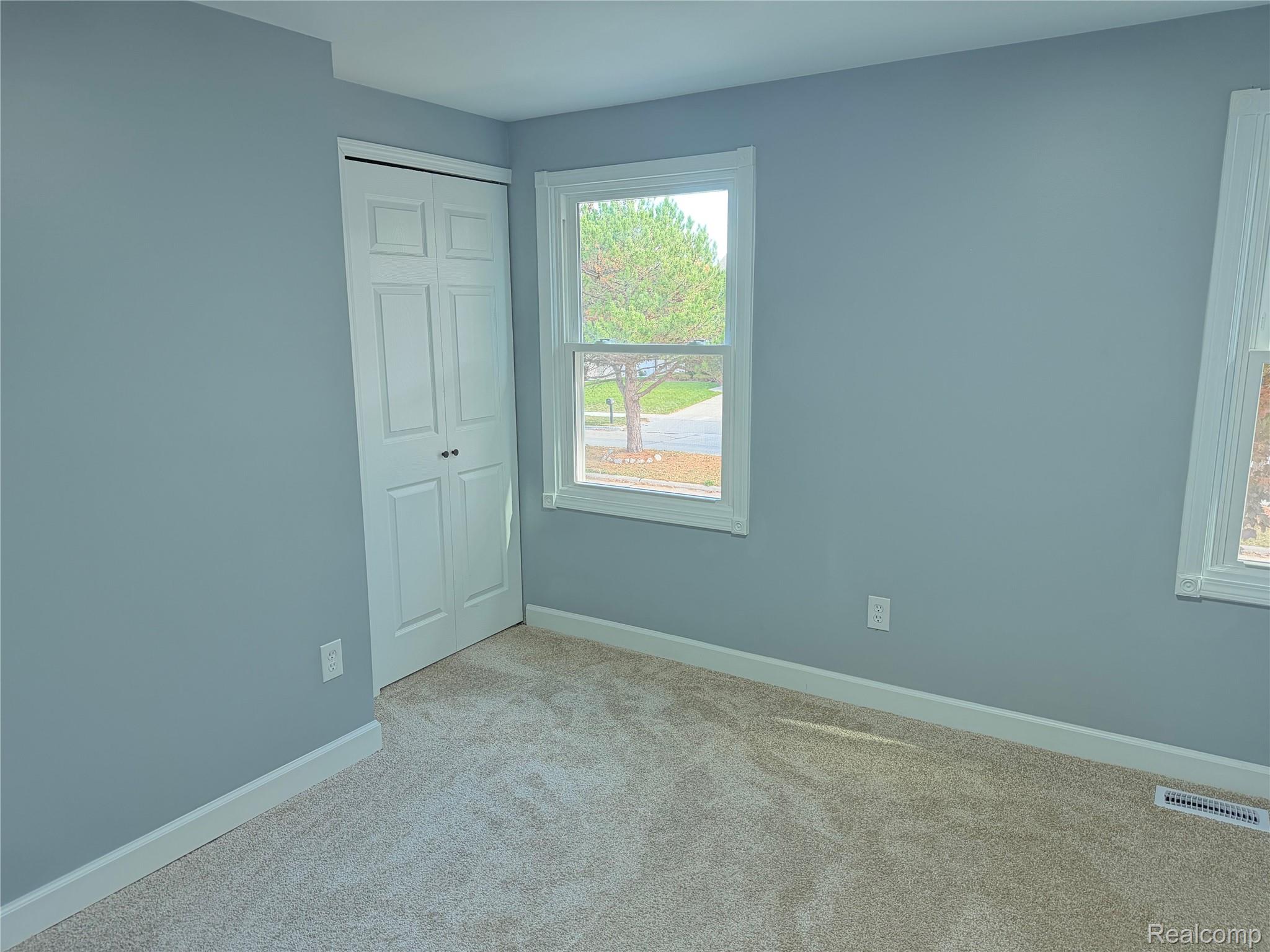 20698 Coachwood Road Riverview, MI 48193 - Photo 31 of 37 Unfurnished bedroom featuring carpet flooring and a closet