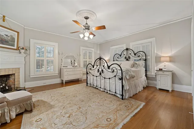 a bedroom with furniture and a window