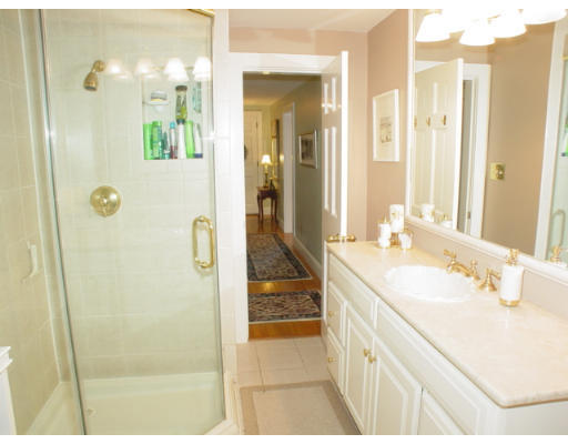 192 Holt Road Andover, MA 01810 - Photo 12 of 24 a bathroom with a sink and mirror