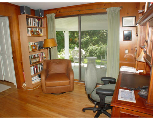 192 Holt Road Andover, MA 01810 - Photo 13 of 24 a living room with furniture and a floor to ceiling window