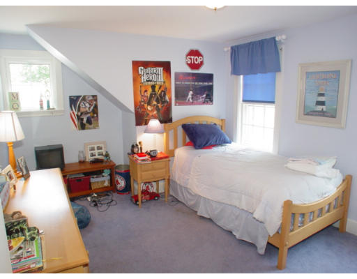 192 Holt Road Andover, MA 01810 - Photo 19 of 24 a bed room with a bed and a chair