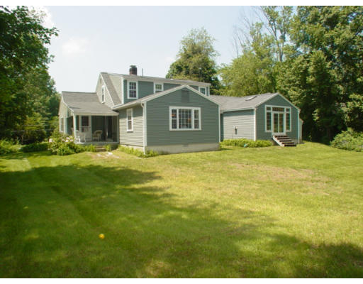 192 Holt Road Andover, MA 01810 - Photo 24 of 24 a front view of house with yard and trees in the background