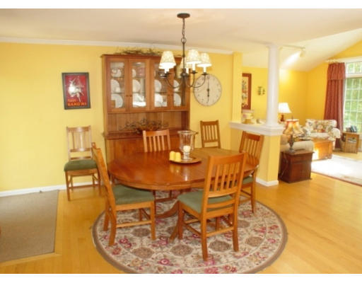 192 Holt Road Andover, MA 01810 - Photo 6 of 24 a view of a dining room with furniture and chandelier