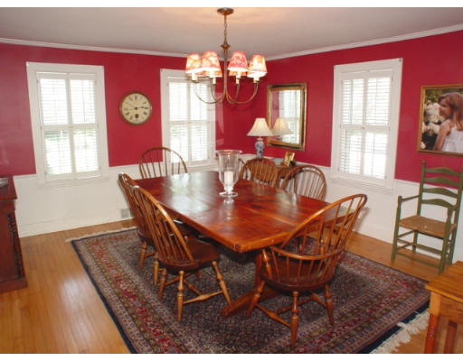 192 Holt Road Andover, MA 01810 - Photo 9 of 24 a view of a dining room with furniture and chandelier