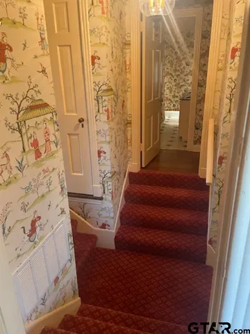 a view of a porch and garden