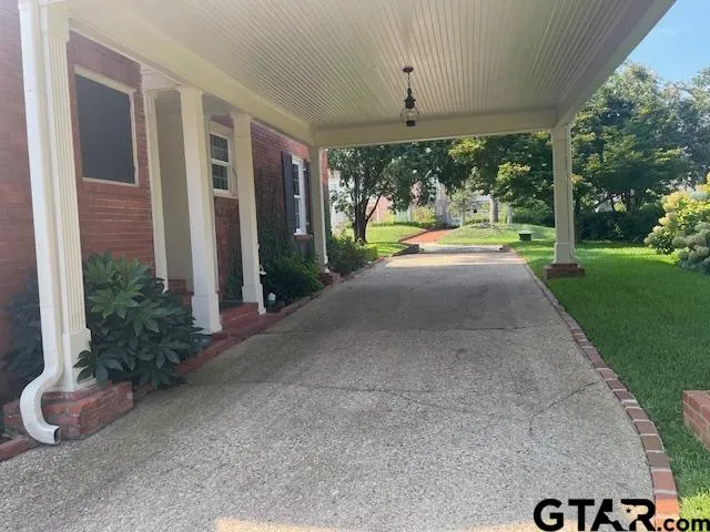 a view of a backyard with an outdoor space