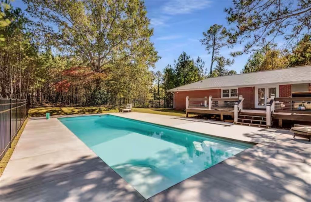 4050 Washington Road East Point, GA 30344 - Photo 15 of 58 a view of a house with swimming pool