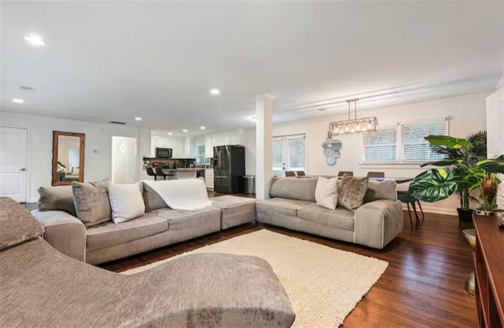4050 Washington Road East Point, GA 30344 - Photo 19 of 58 a living room with furniture and a wooden floor
