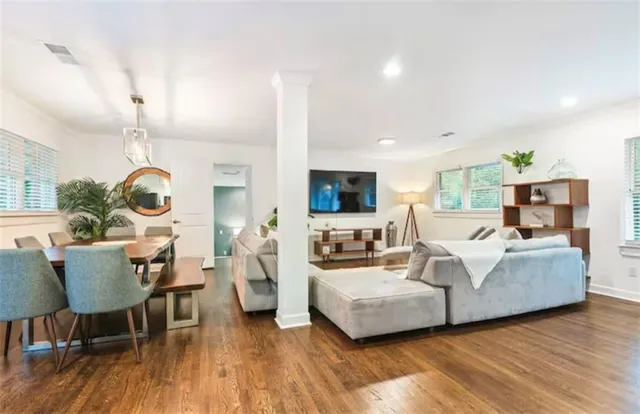 a kitchen with stainless steel appliances granite countertop a refrigerator stove microwave and sink