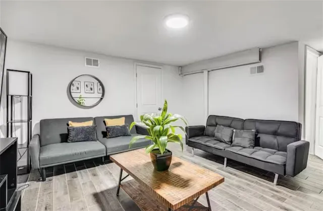 a bathroom with a shower and a toilet