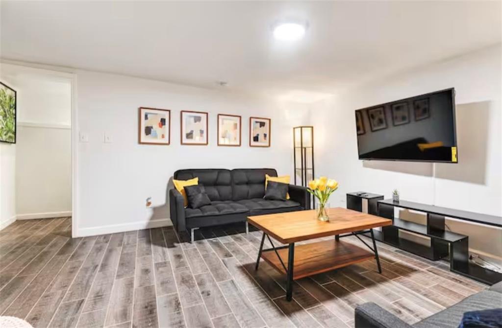 4050 Washington Road East Point, GA 30344 - Photo 42 of 58 a living room with furniture and a flat screen tv