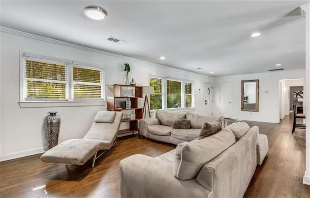4050 Washington Road East Point, GA 30344 - Photo 6 of 58 a living room with furniture and wooden floor