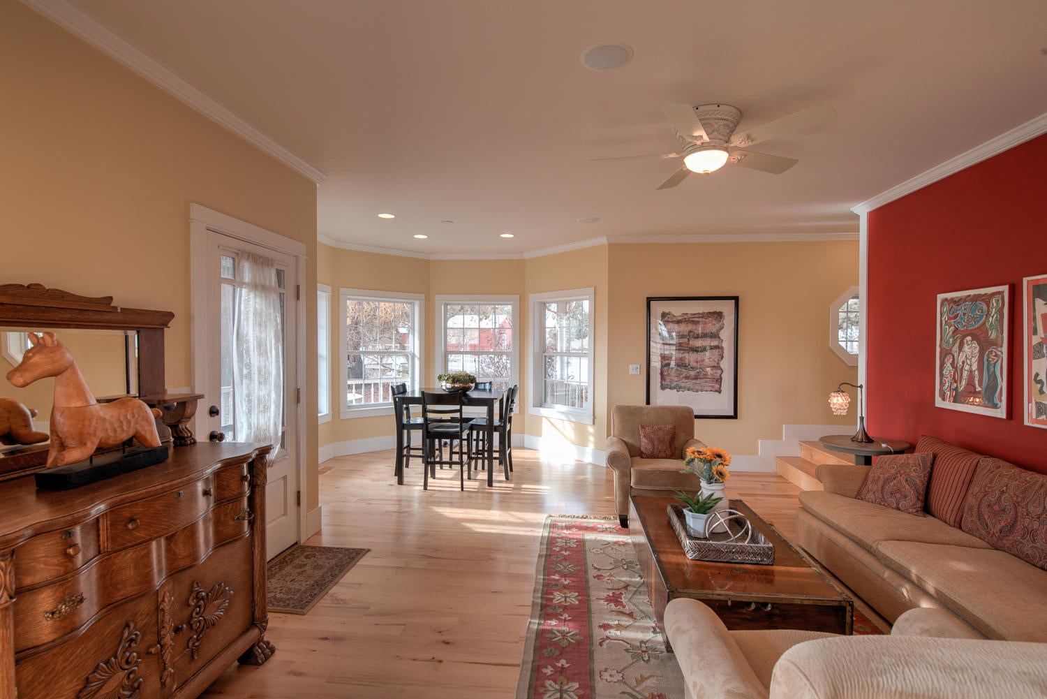 View from dining area to alcove. Door on left to garden.