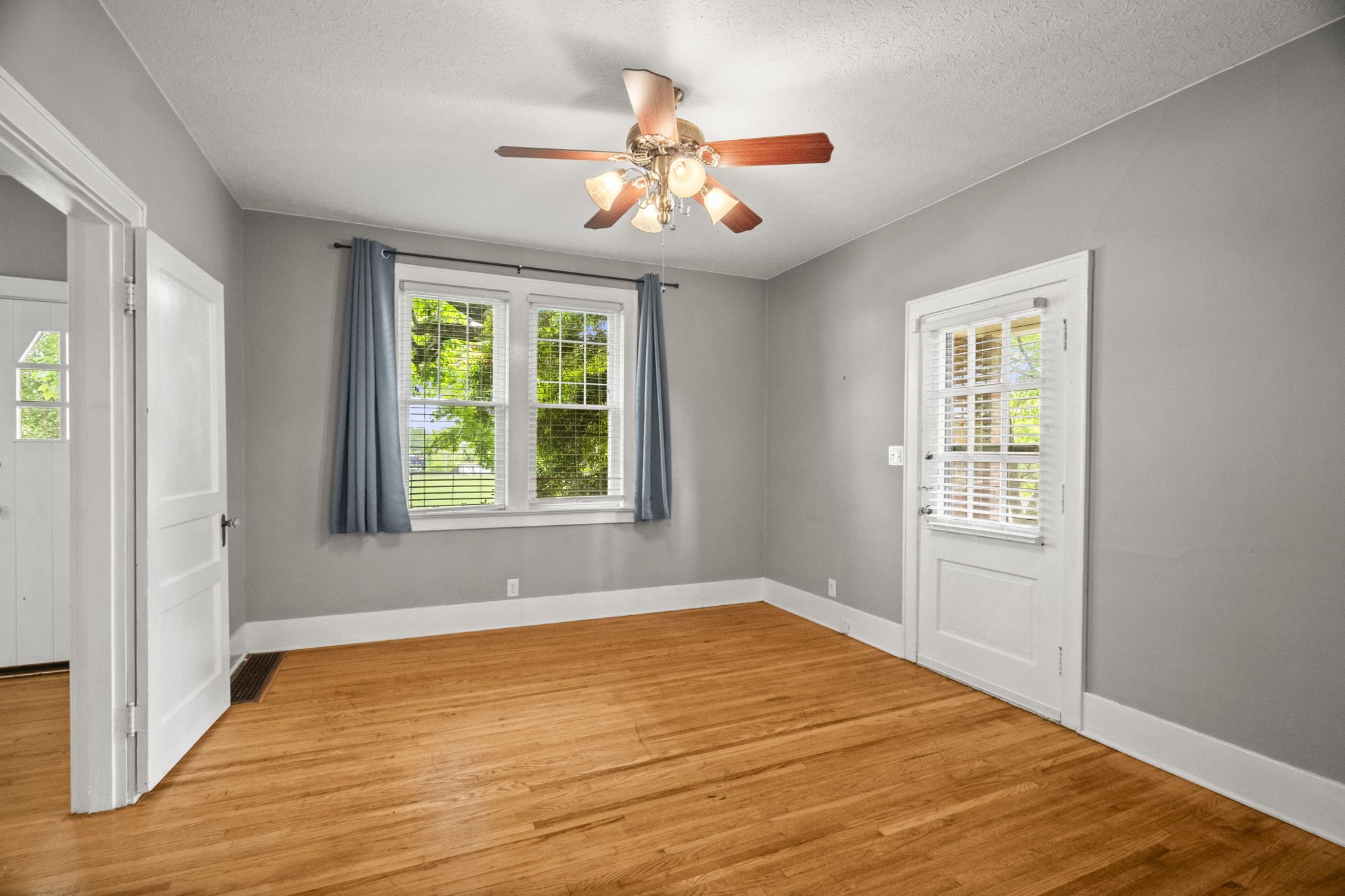 400 Connell Street Springfield, TN 37172 - Photo 5 of 53 a view of an empty room with wooden floor and a window