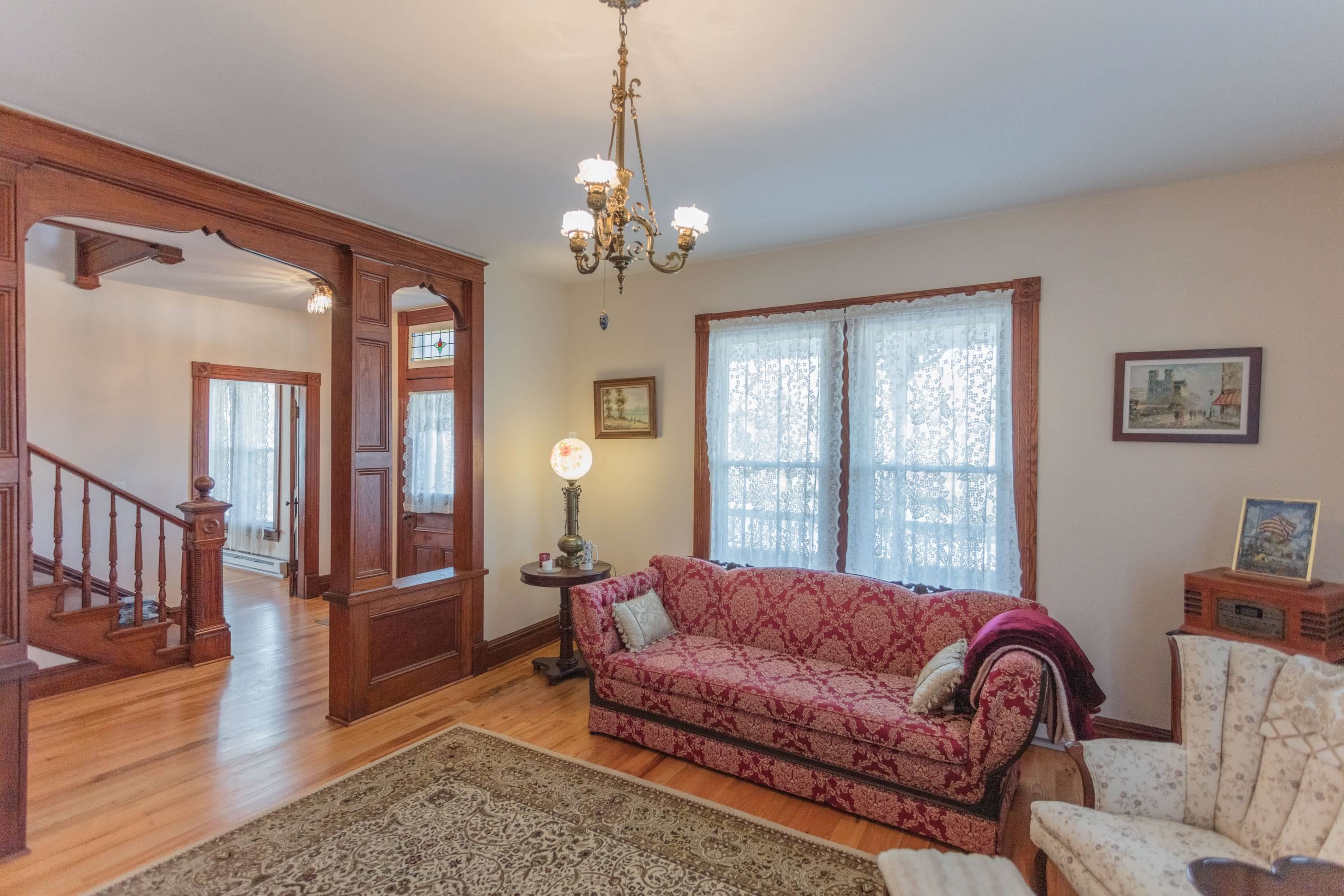 11 Shady Lane Raphine, VA 24472 - Photo 13 of 41 a spacious bedroom with a bed couch and a window