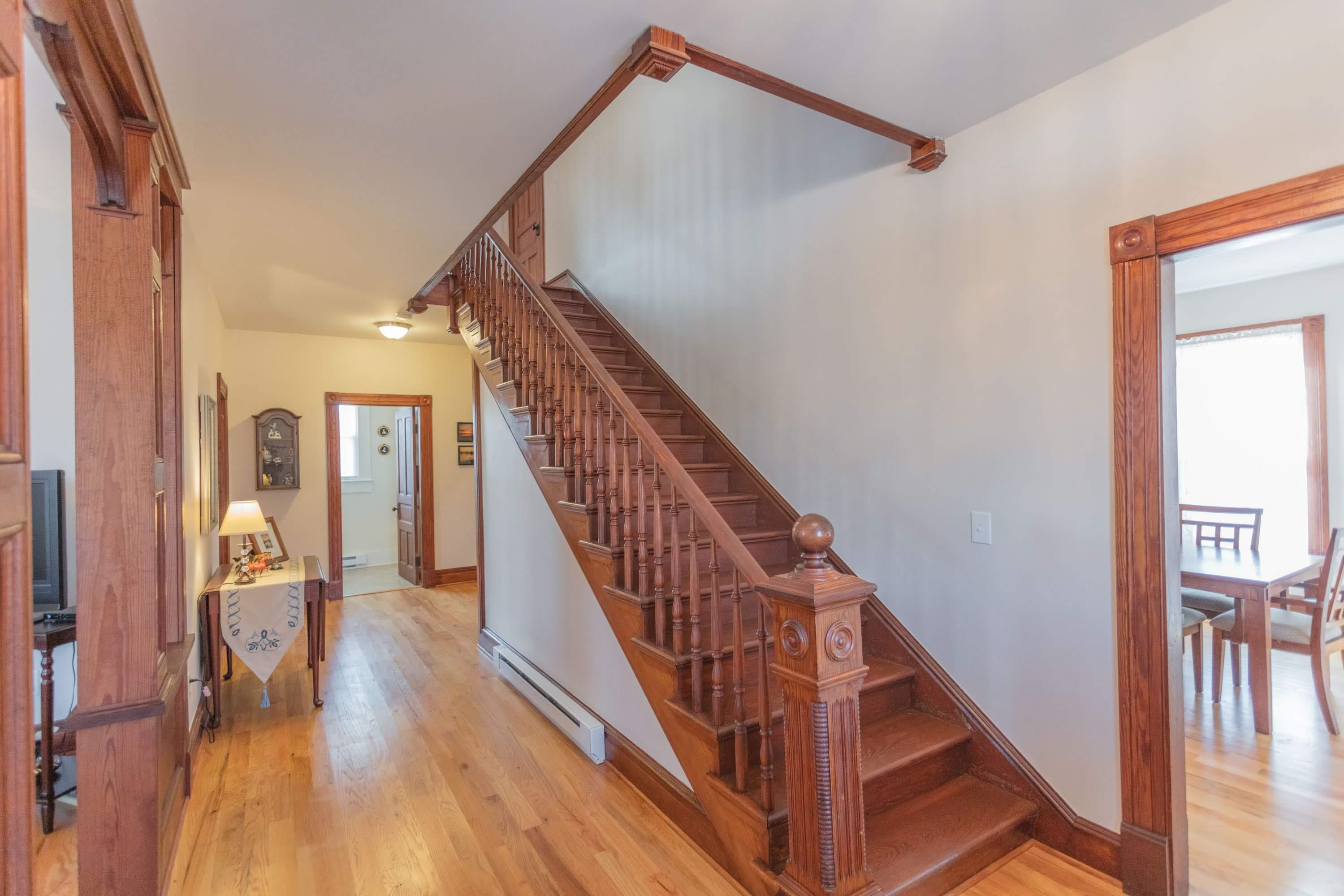 11 Shady Lane Raphine, VA 24472 - Photo 15 of 41 a view of a hallway with wooden floor and staircase
