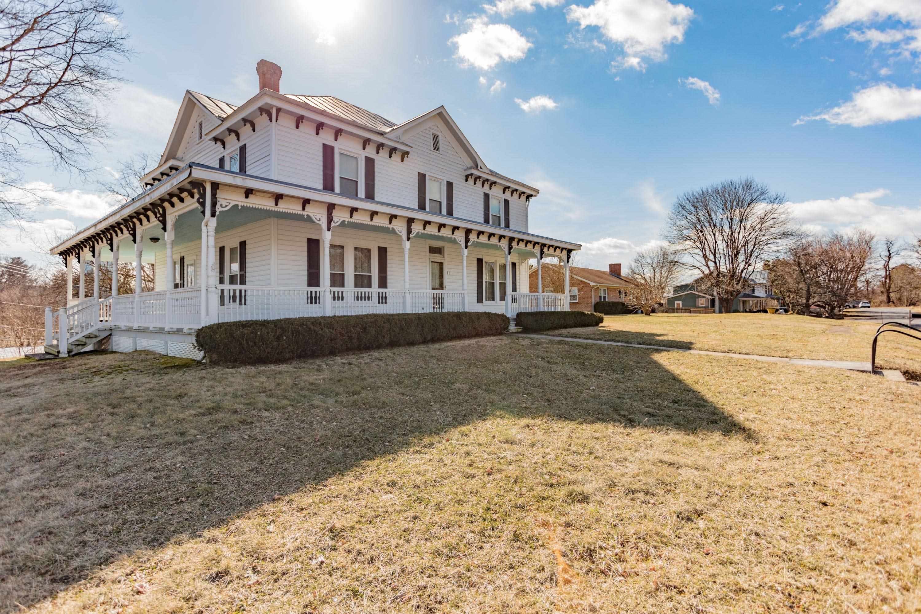 11 Shady Lane Raphine, VA 24472 - Photo 2 of 41 a front view of a house with a yard