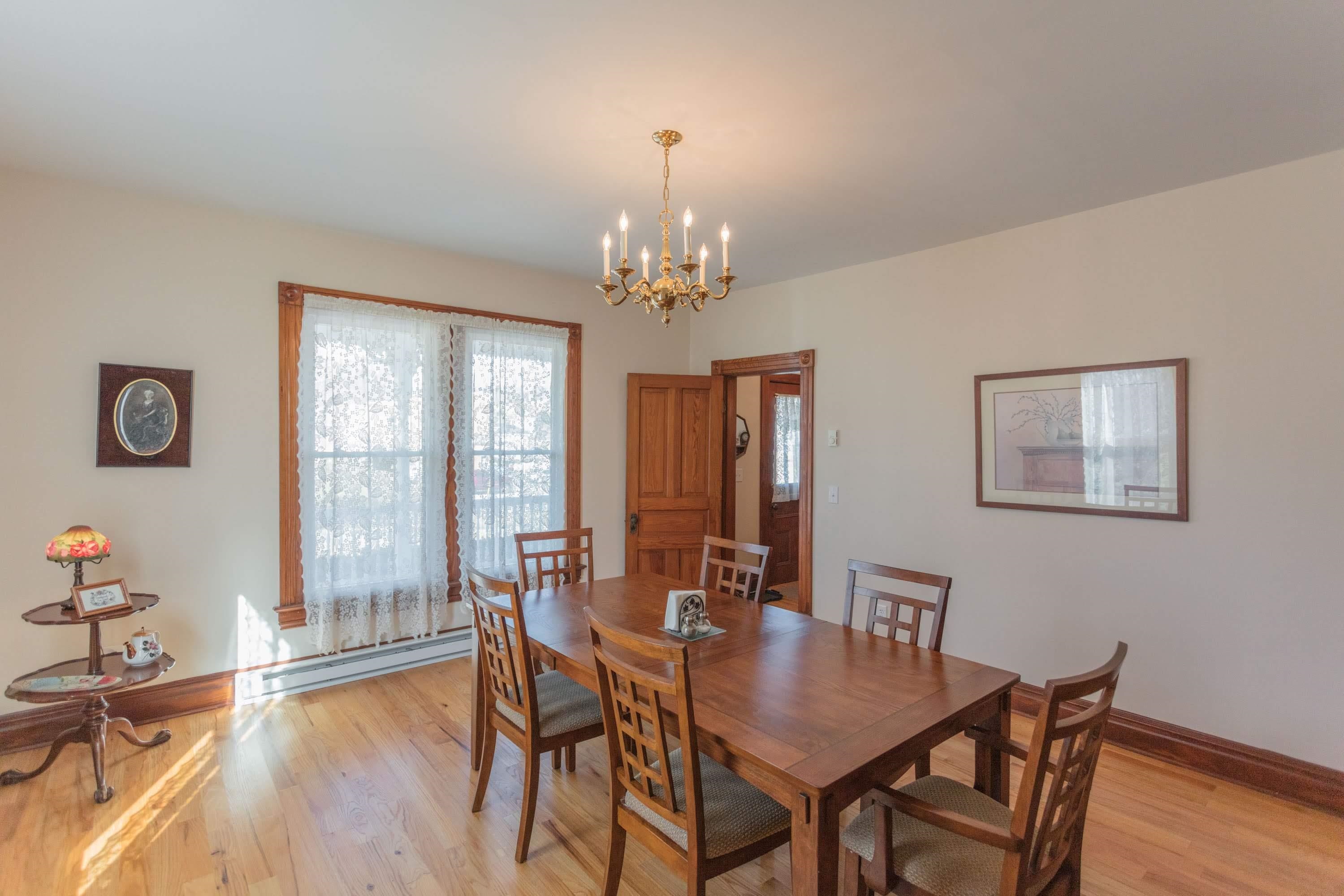 11 Shady Lane Raphine, VA 24472 - Photo 26 of 41 a view of a dining room with furniture wooden floor and chandelier