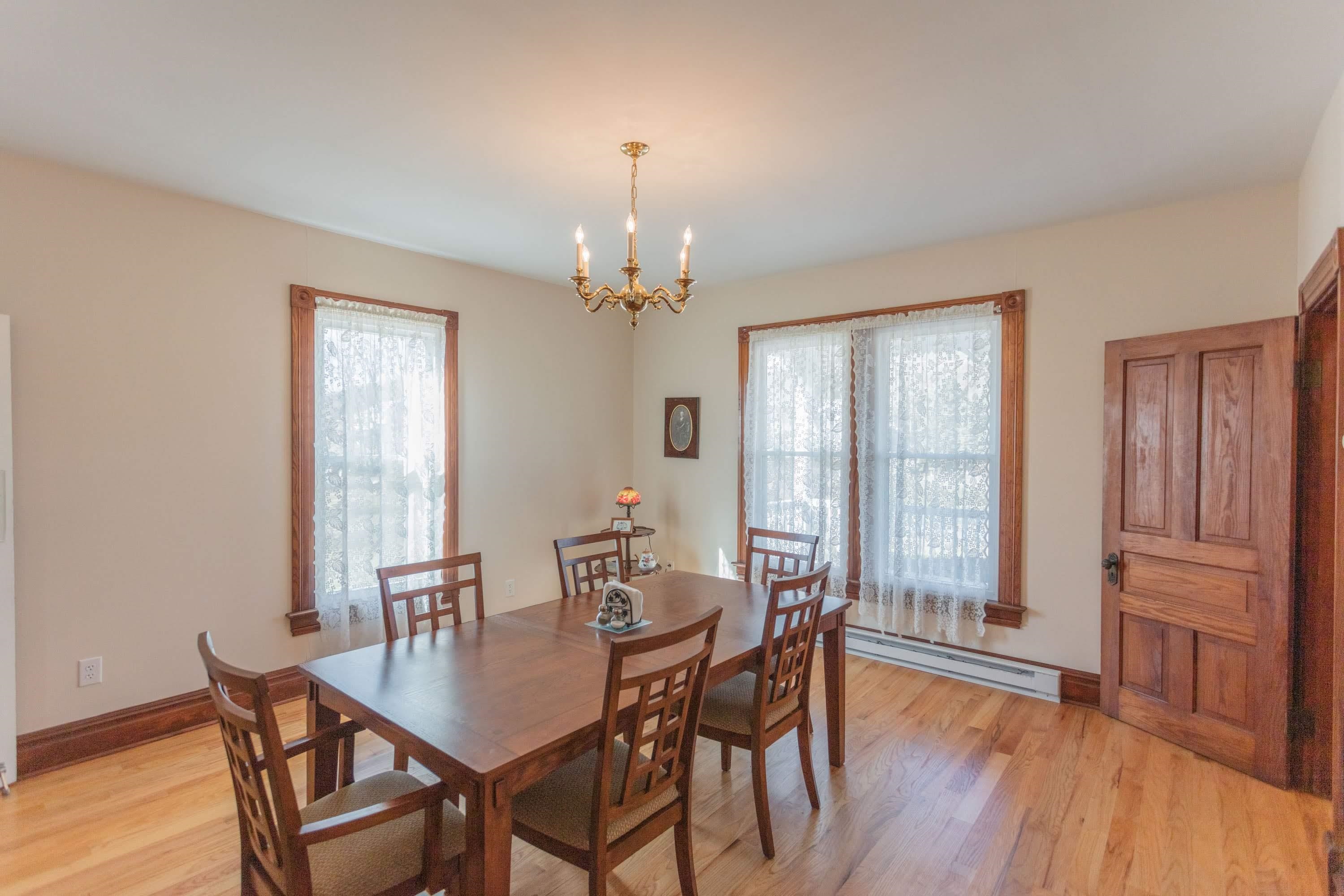 11 Shady Lane Raphine, VA 24472 - Photo 27 of 41 a view of a dining room with furniture window and wooden floor