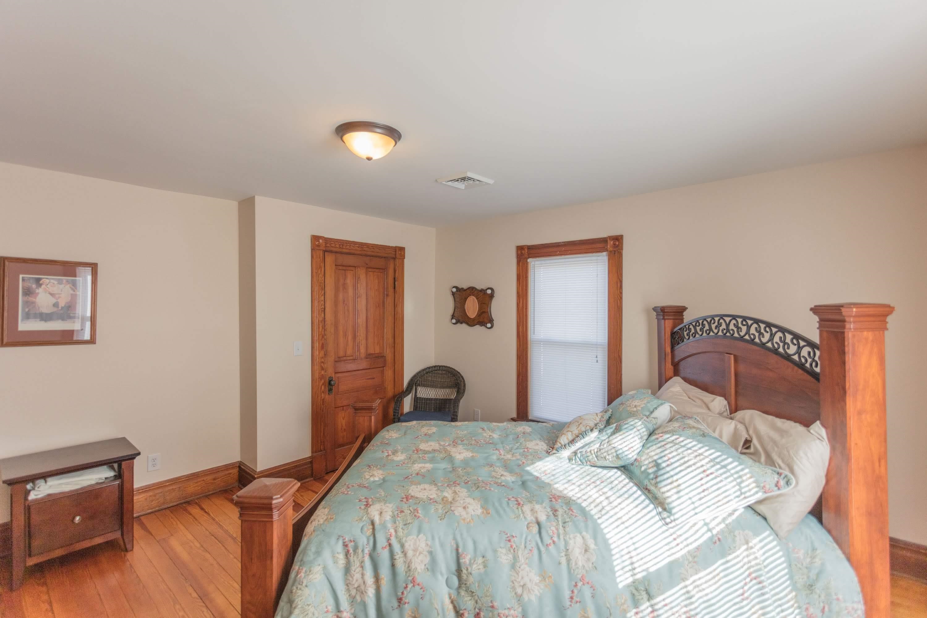 11 Shady Lane Raphine, VA 24472 - Photo 29 of 41 a bedroom with a bed and wooden floor