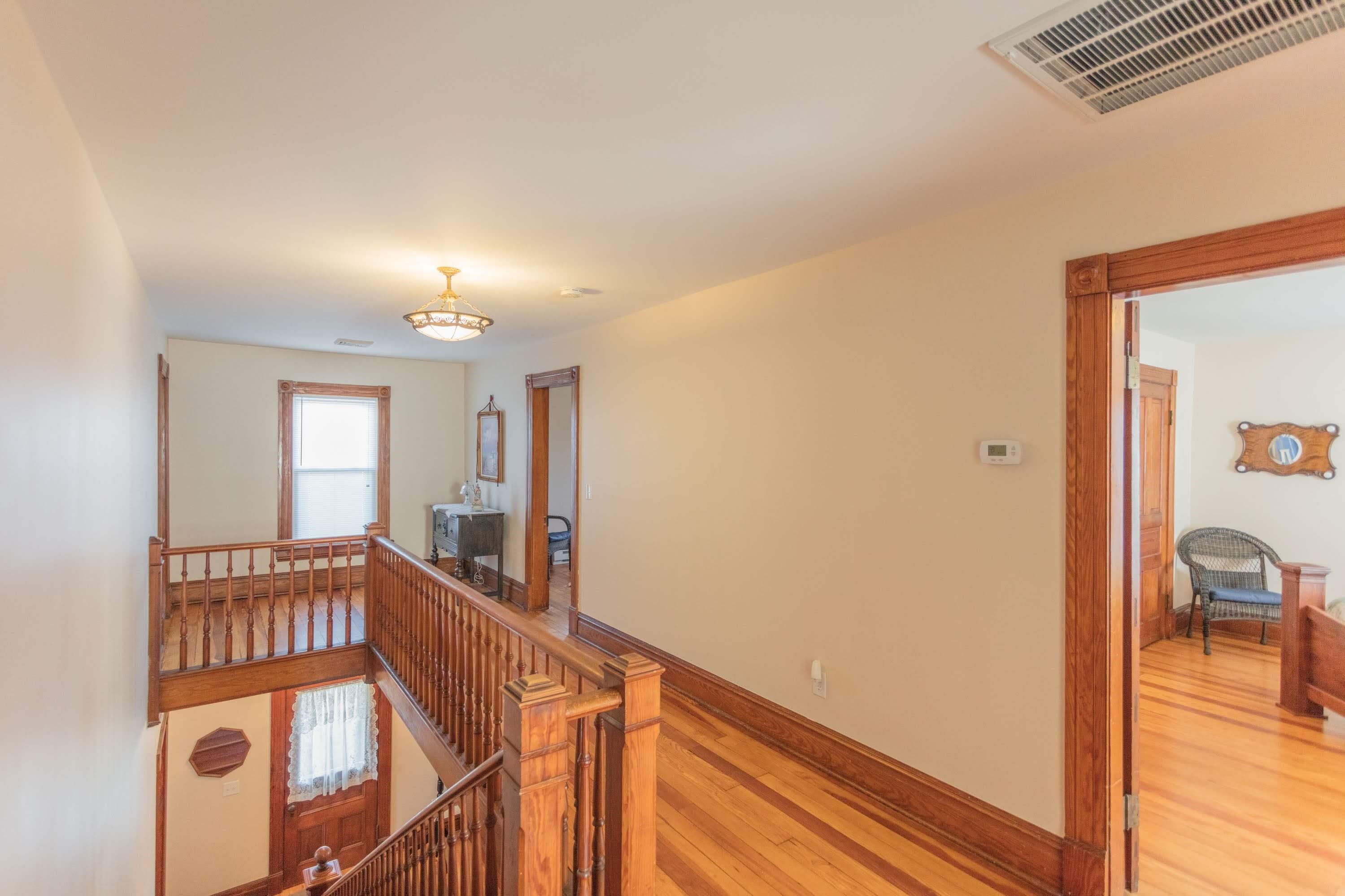 11 Shady Lane Raphine, VA 24472 - Photo 36 of 41 a view of a hallway with a dining table and chairs