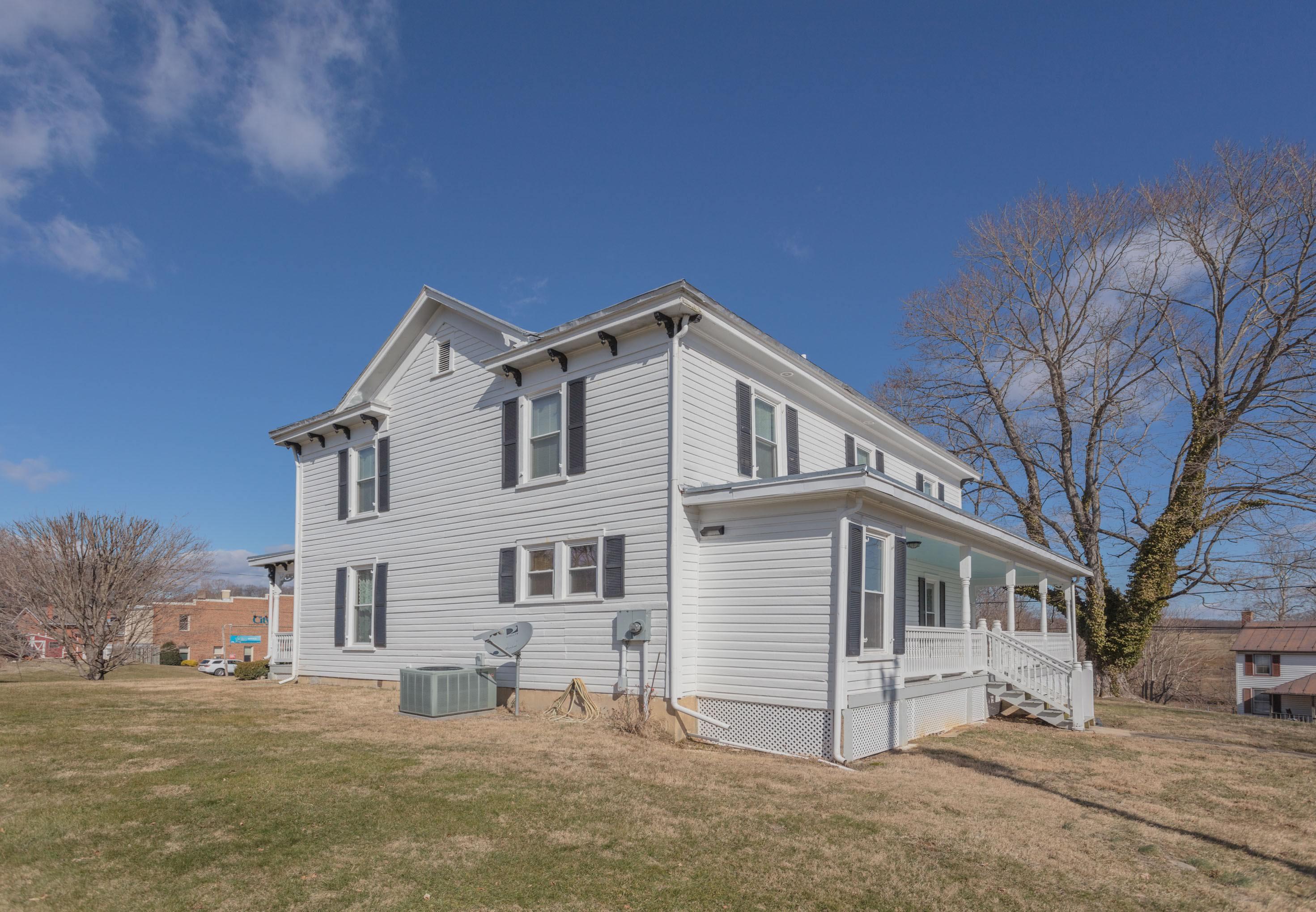 11 Shady Lane Raphine, VA 24472 - Photo 5 of 41 a view of a white house with a large windows