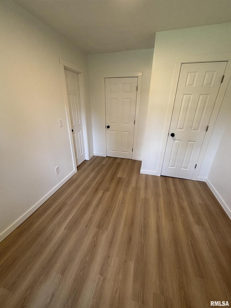 527 South Rotan Street Salem, IL 62881 - Photo 17 of 17 a view of a room with wooden floor and staircase