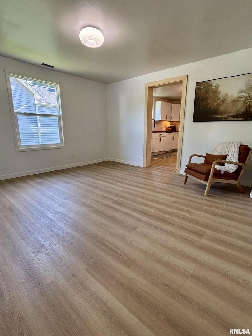 527 South Rotan Street Salem, IL 62881 - Photo 6 of 17 wooden floor with furniture and window in room