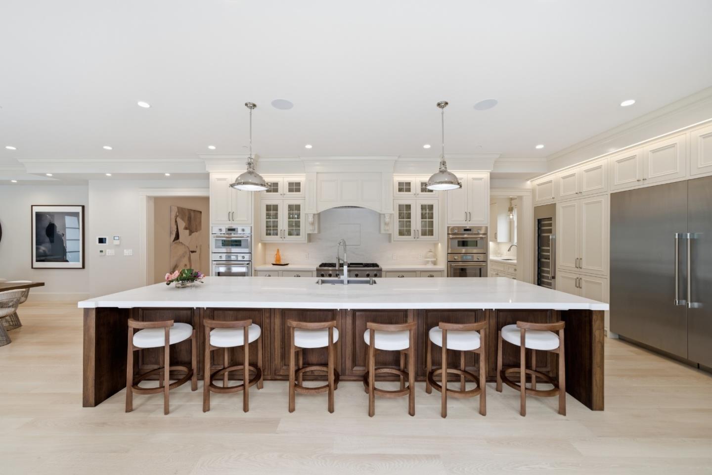 830 Bromfield Road San Mateo, CA 94402 - Photo 18 of 93 a large kitchen with a table and chairs