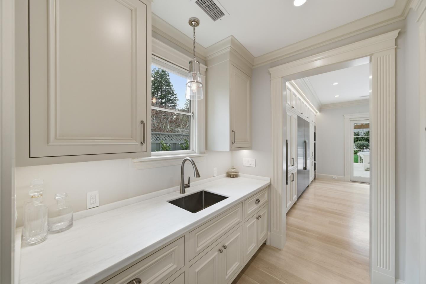 830 Bromfield Road San Mateo, CA 94402 - Photo 24 of 93 a kitchen with a sink cabinets and window