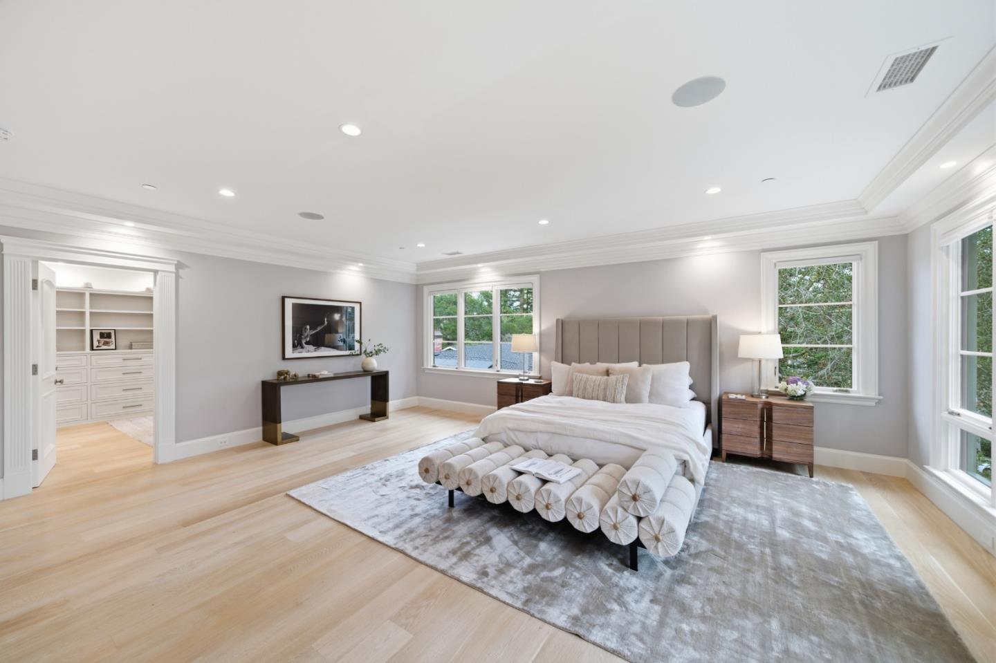 830 Bromfield Road San Mateo, CA 94402 - Photo 33 of 93 a spacious bedroom with a large bed and a view of kitchen