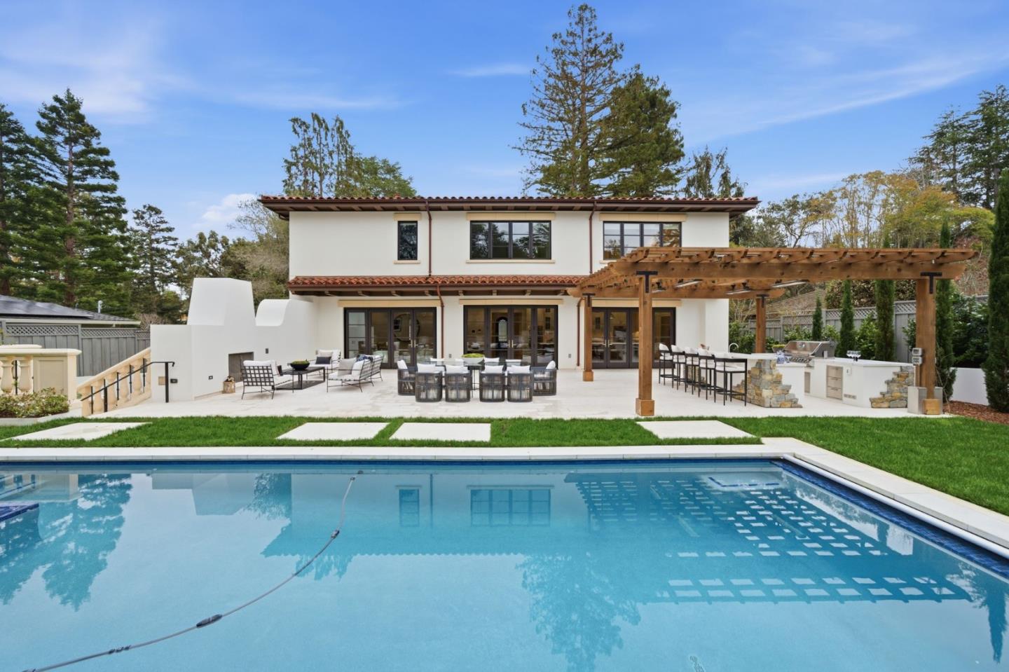 830 Bromfield Road San Mateo, CA 94402 - Photo 66 of 93 a view of a swimming pool with a patio