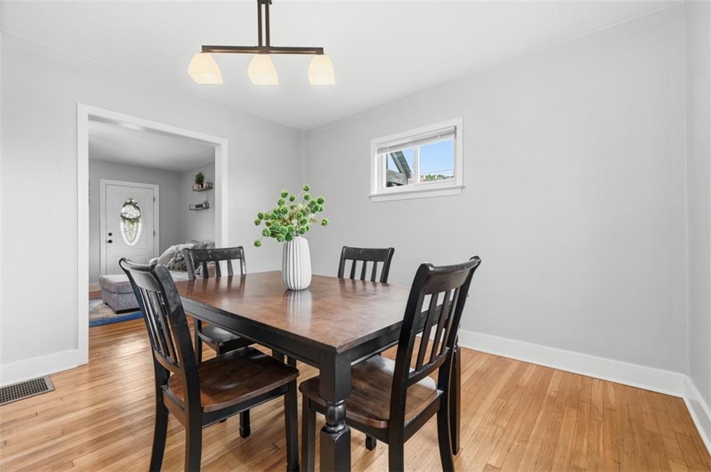 405 Shadyhill Road Pittsburgh, PA 15205 - Photo 11 of 34 a dining room with furniture and wooden floor