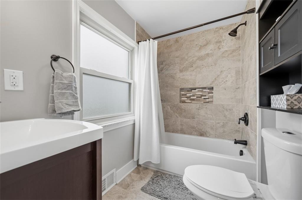 405 Shadyhill Road Pittsburgh, PA 15205 - Photo 18 of 34 a bathroom with a sink a toilet and shower