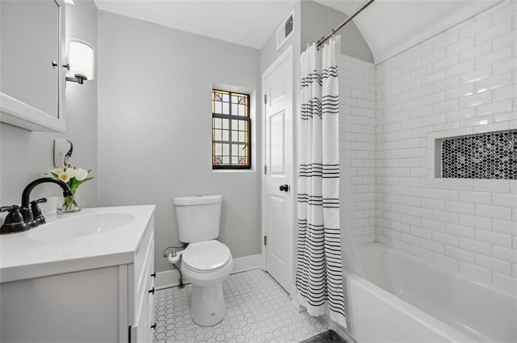 405 Shadyhill Road Pittsburgh, PA 15205 - Photo 20 of 34 a bathroom with a sink a toilet and shower
