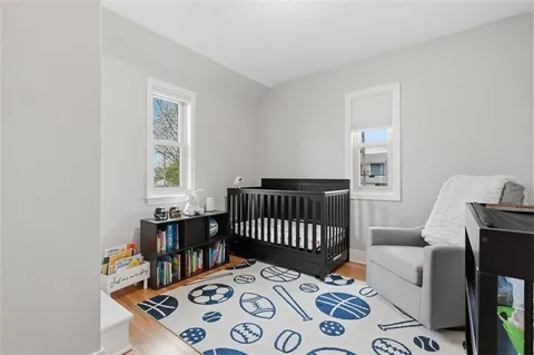 a bedroom with furniture and a window