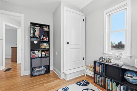 a view of a livingroom with furniture and windows