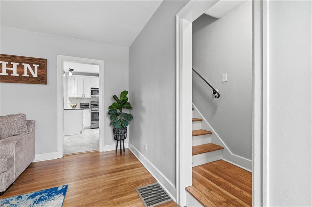 405 Shadyhill Road Pittsburgh, PA 15205 - Photo 10 of 34 a view of a hallway view with wooden floor and staircase