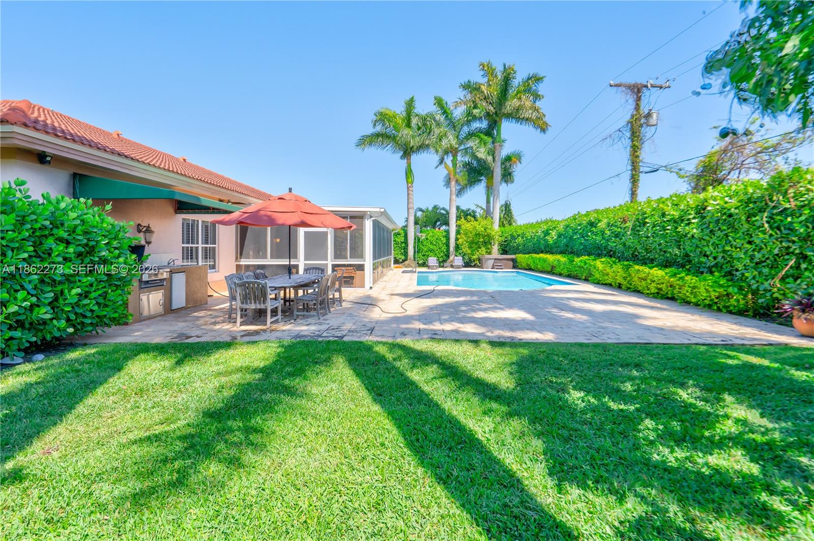 8366 Southwest 193rd Street Cutler Bay, FL 33157 - Photo 11 of 20 a house with garden in front of it