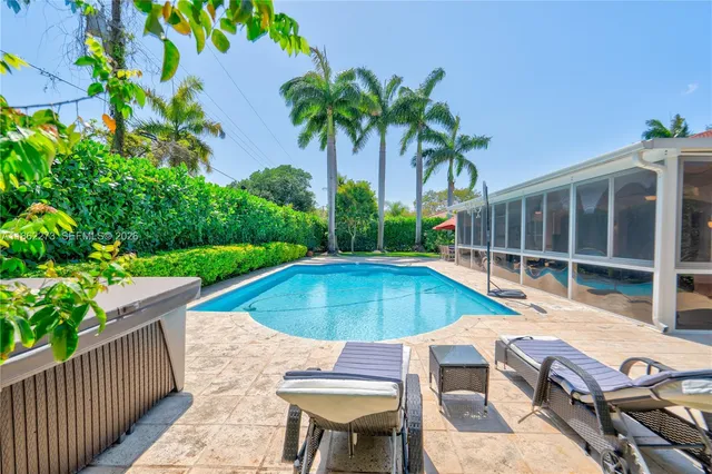 a view of outdoor space yard swimming pool and furniture