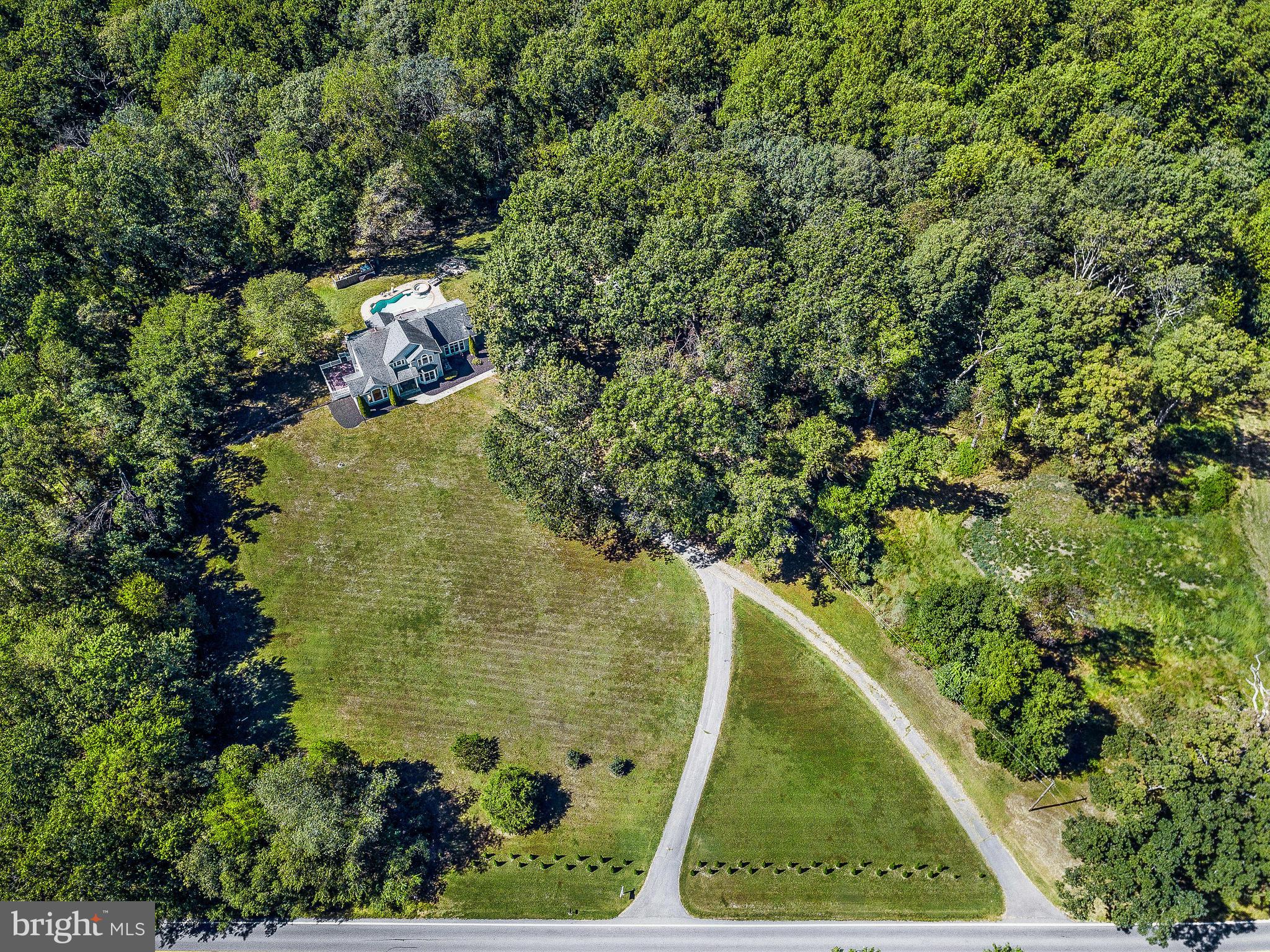 7.38 blissful acres subdividable into four lots!