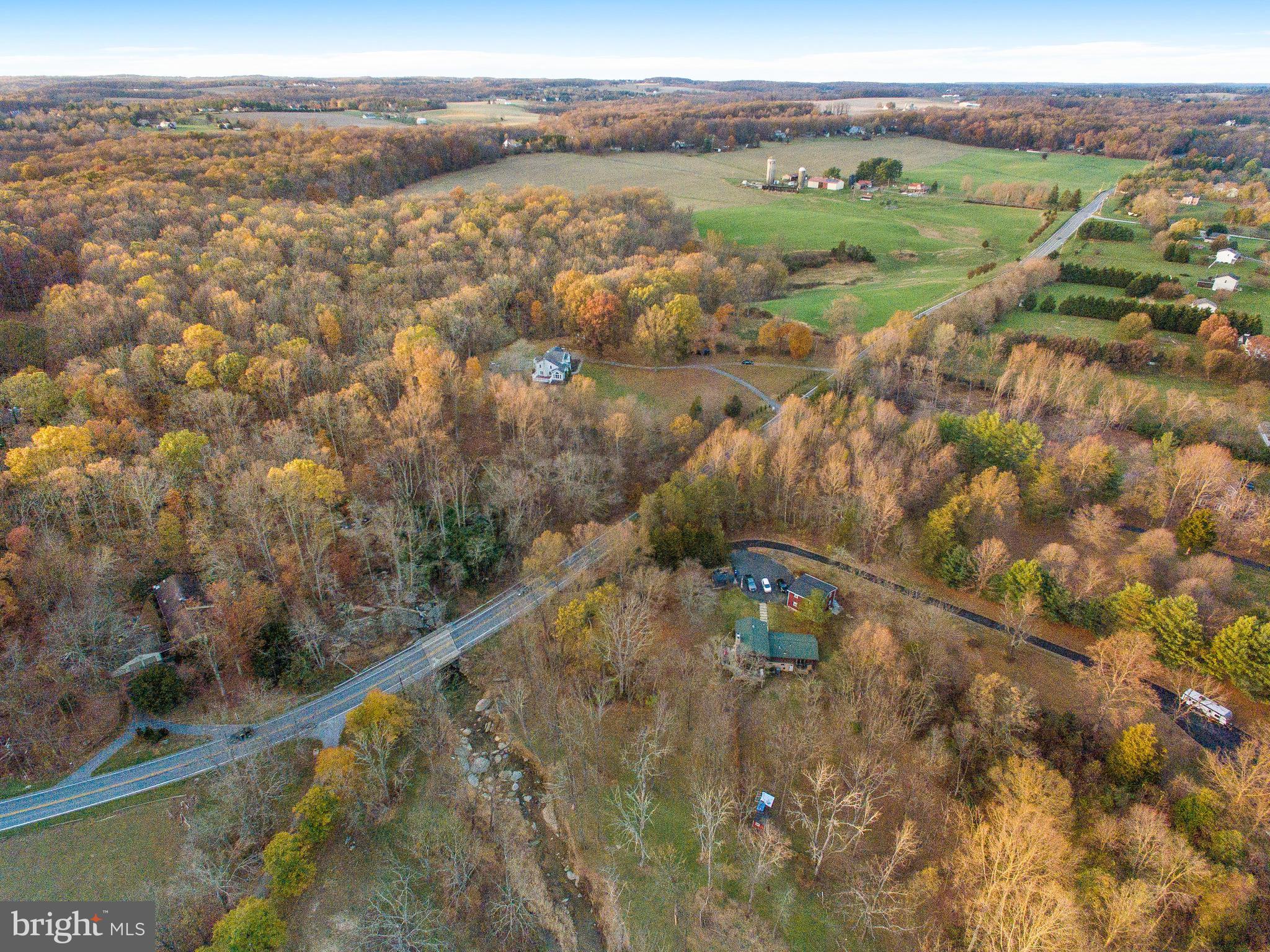 3444 Woodbine Road Woodbine, MD 21797 - Photo 3 of 78 a view of a city with mountains in the background