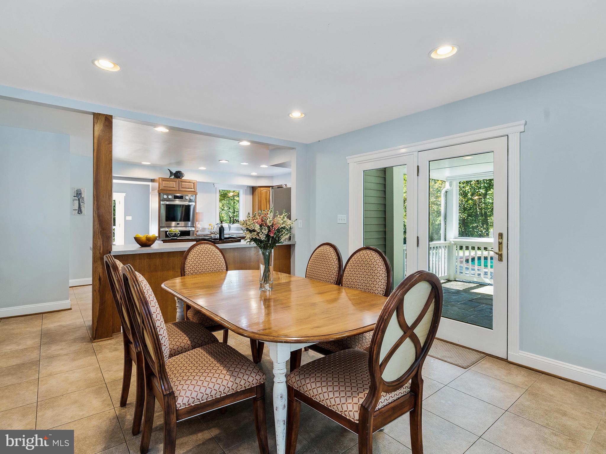 3444 Woodbine Road Woodbine, MD 21797 - Photo 21 of 78 Breakfast room opening to a screen porch