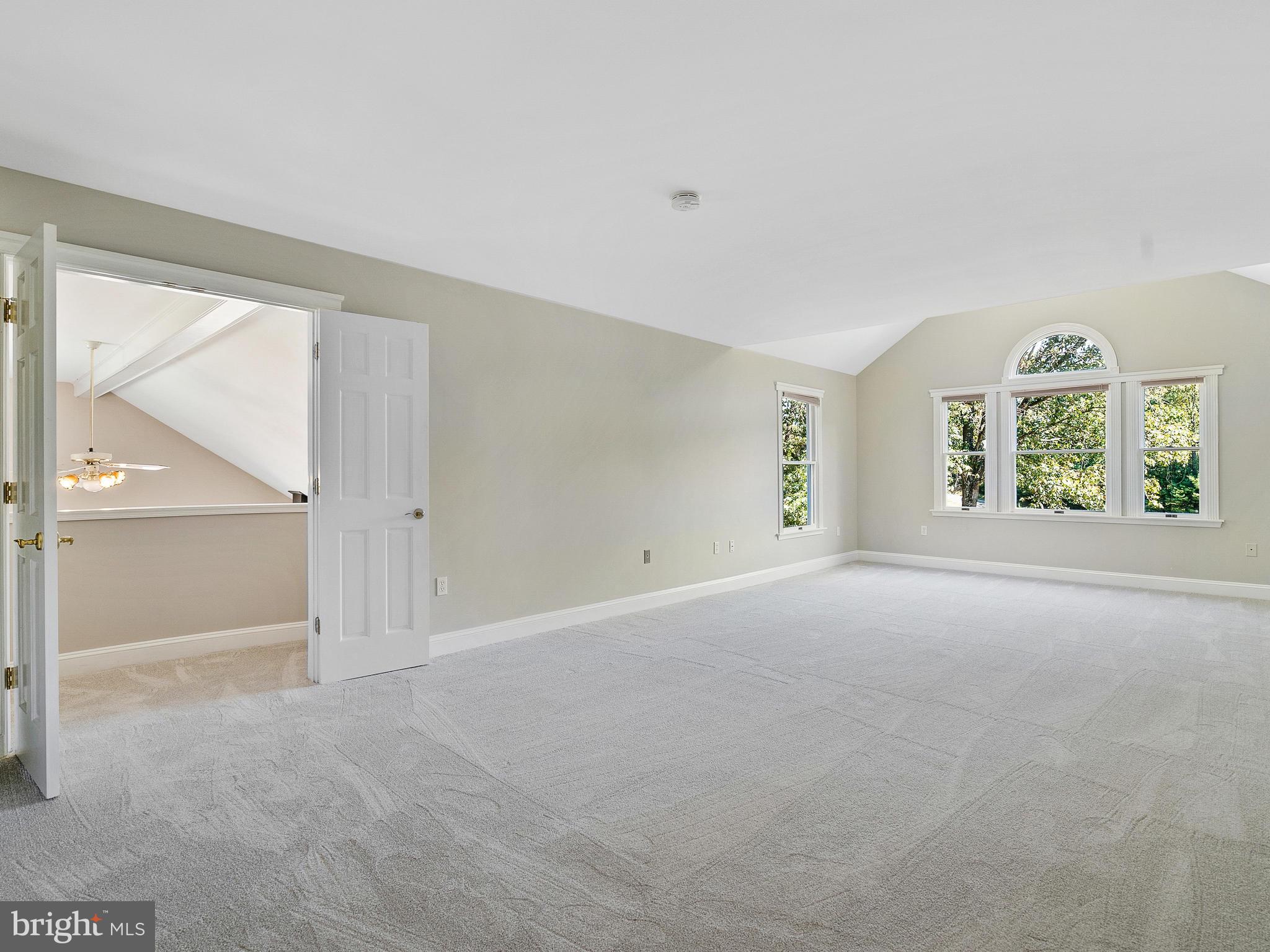 3444 Woodbine Road Woodbine, MD 21797 - Photo 46 of 78 an empty room with windows and entrance