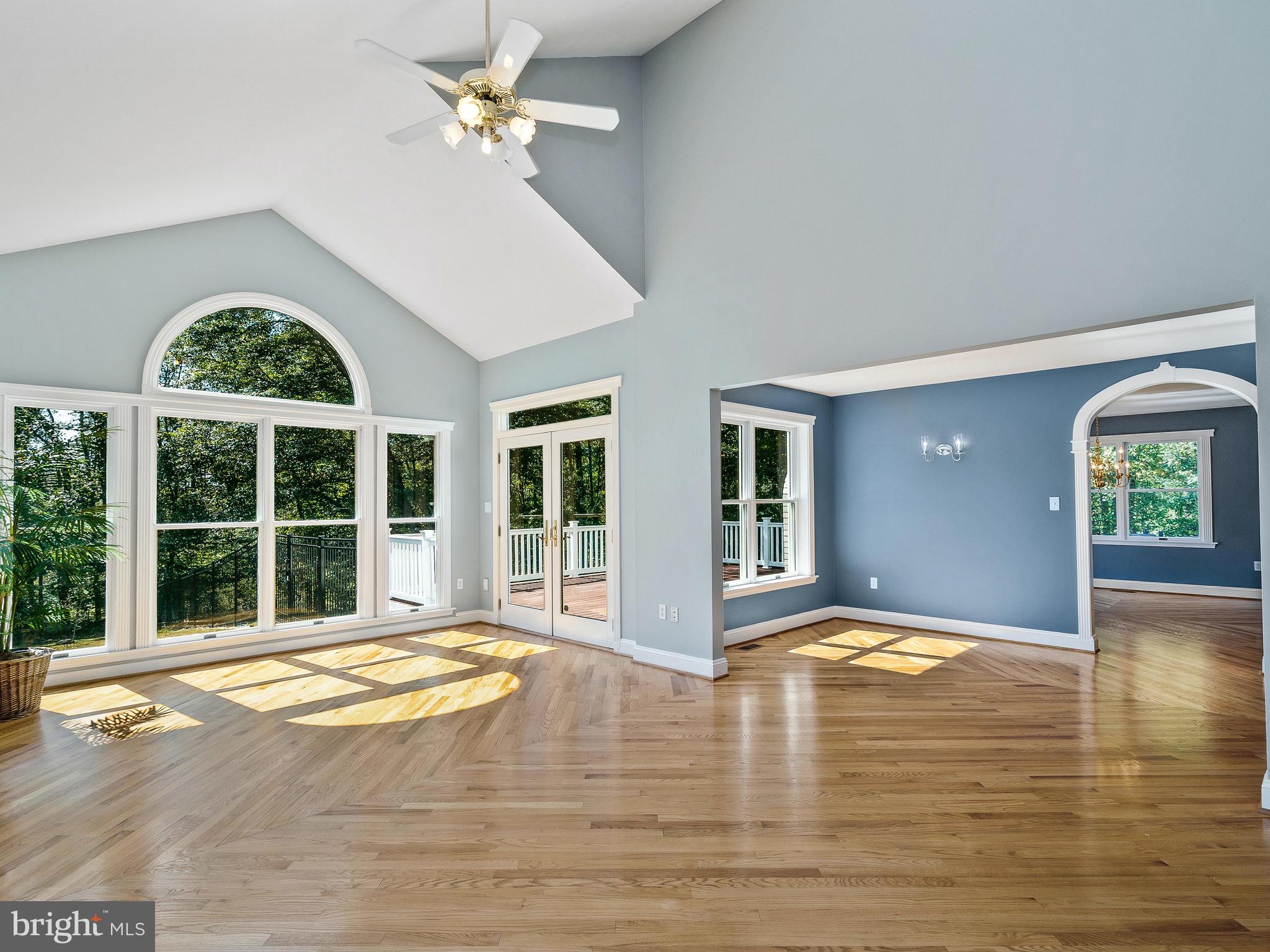 3444 Woodbine Road Woodbine, MD 21797 - Photo 6 of 78 a view of an empty room with wooden floor and a window