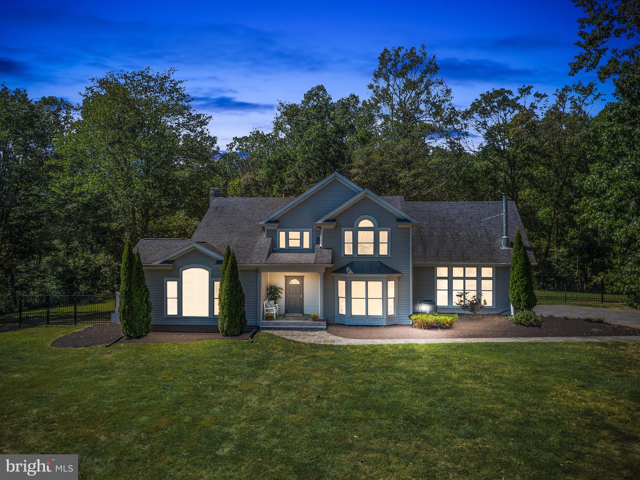 3444 Woodbine Road Woodbine, MD 21797 - Photo 65 of 78 a front view of a house with a yard