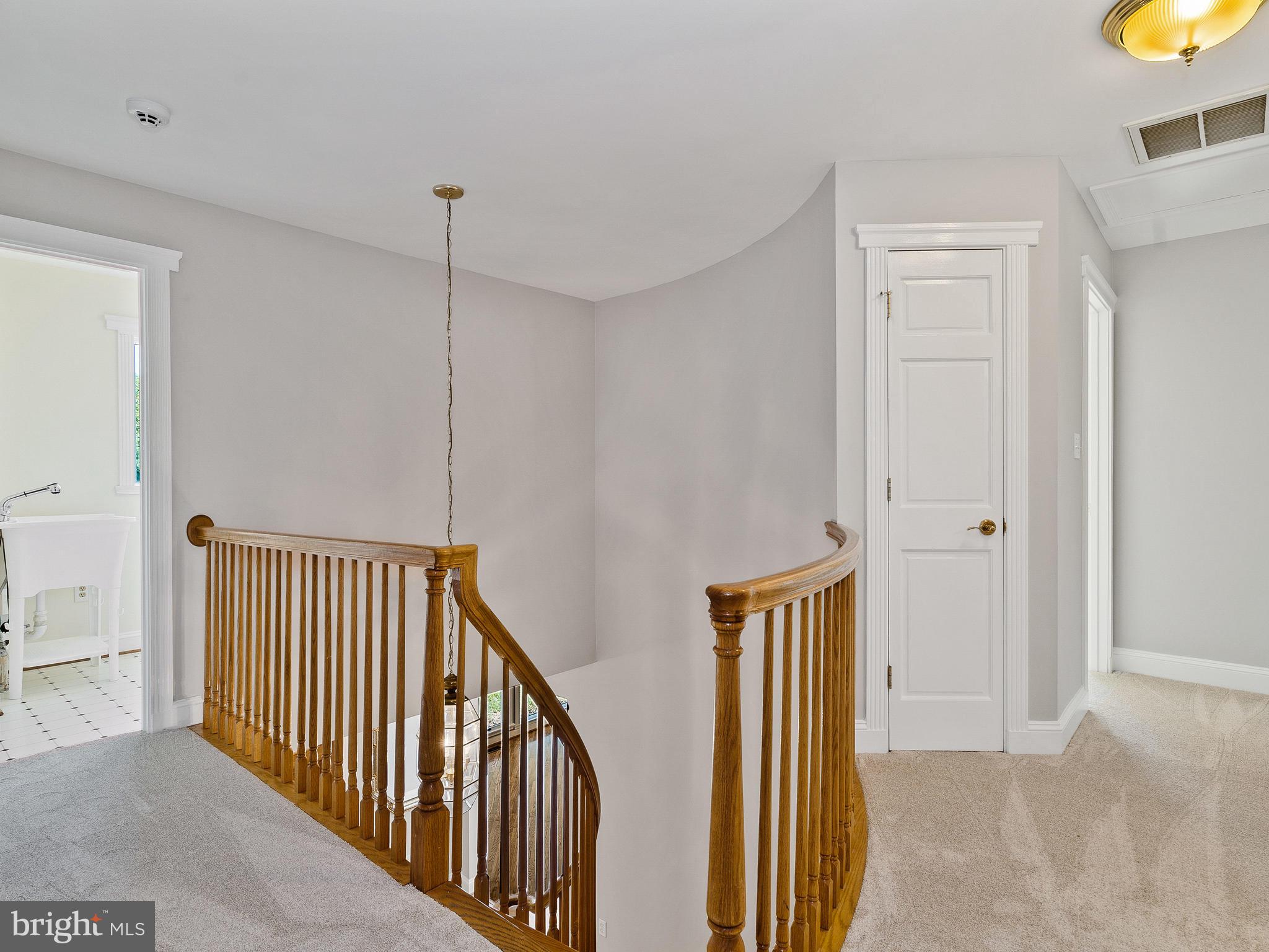 3444 Woodbine Road Woodbine, MD 21797 - Photo 67 of 78 a view of a hallway with wooden floor and entryway